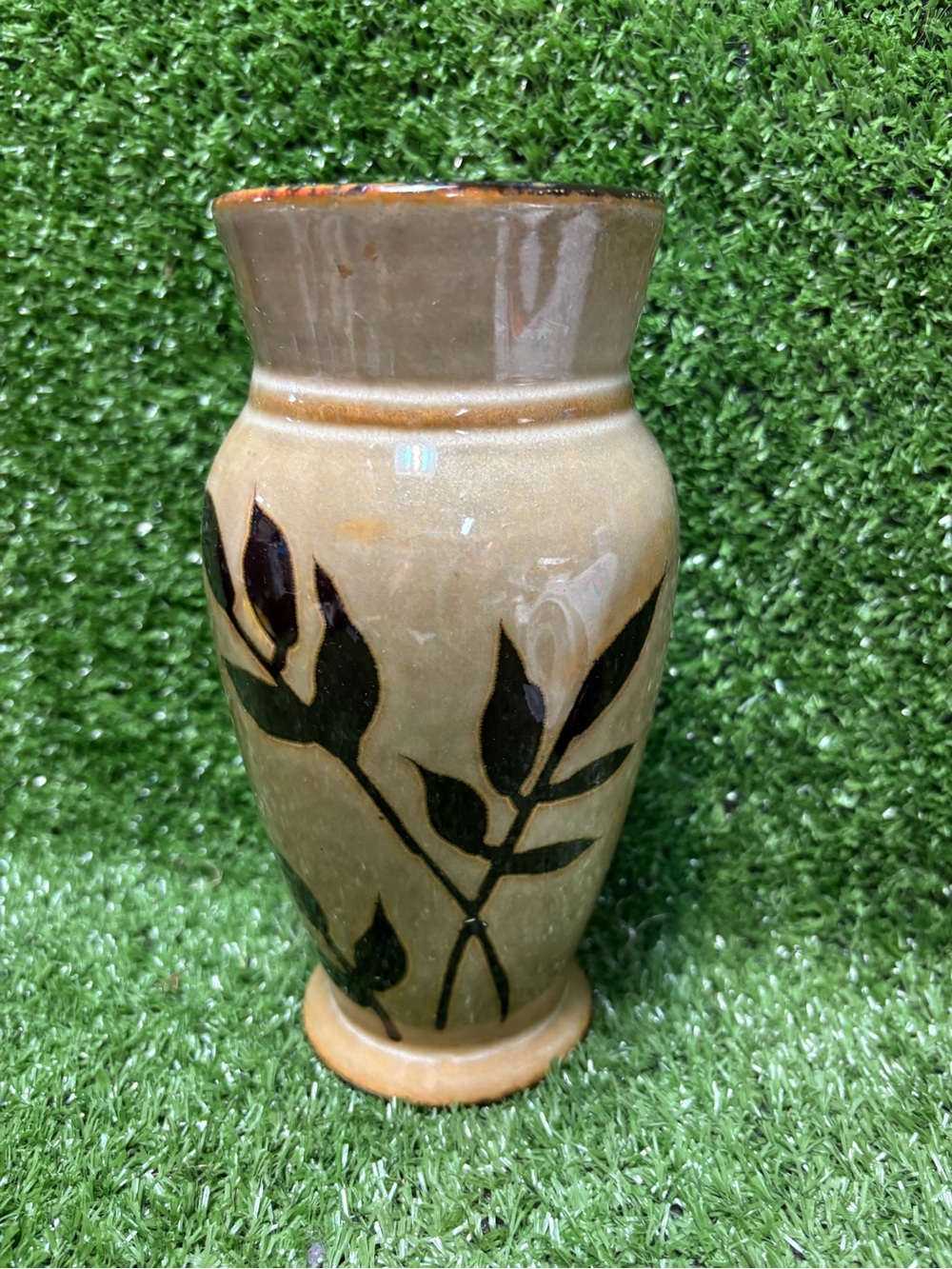 Handcrafted Beige Ceramic Vase with Black Leaf Motif